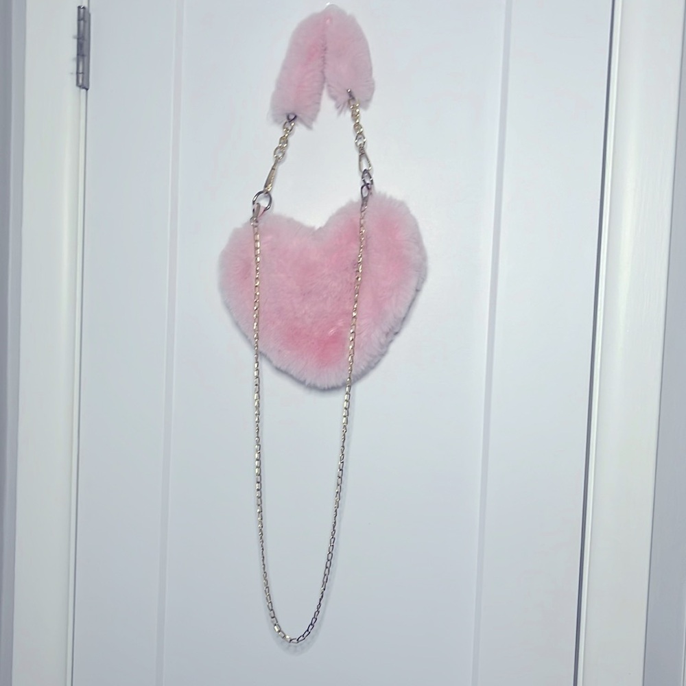 Pink fuzzy heart shaped shoulder/crossbody purse. Lightly used.